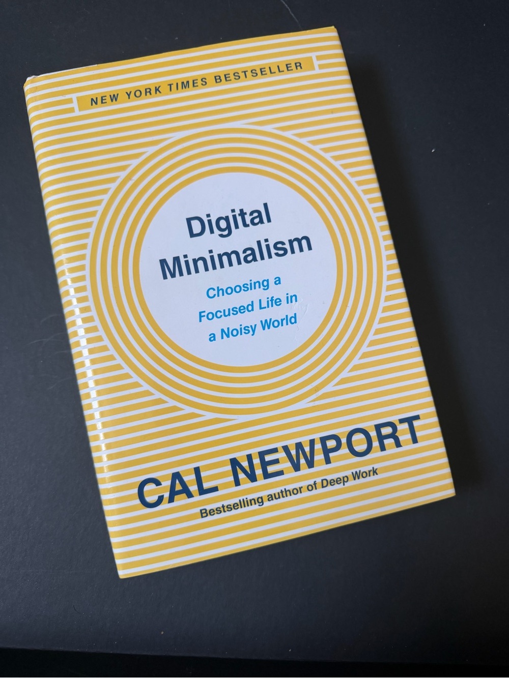 Digital Minimalism by Cal Newport - Yellow & White Hardcover Book